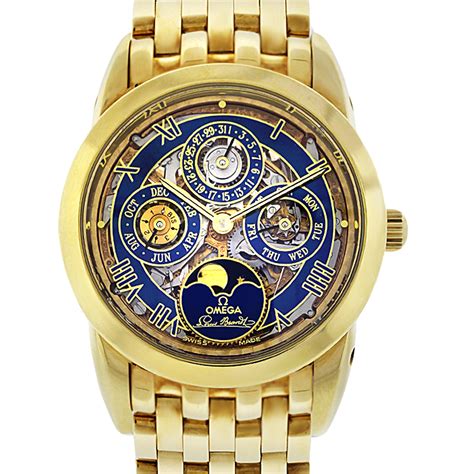 omega skeleton yellow gold watch.